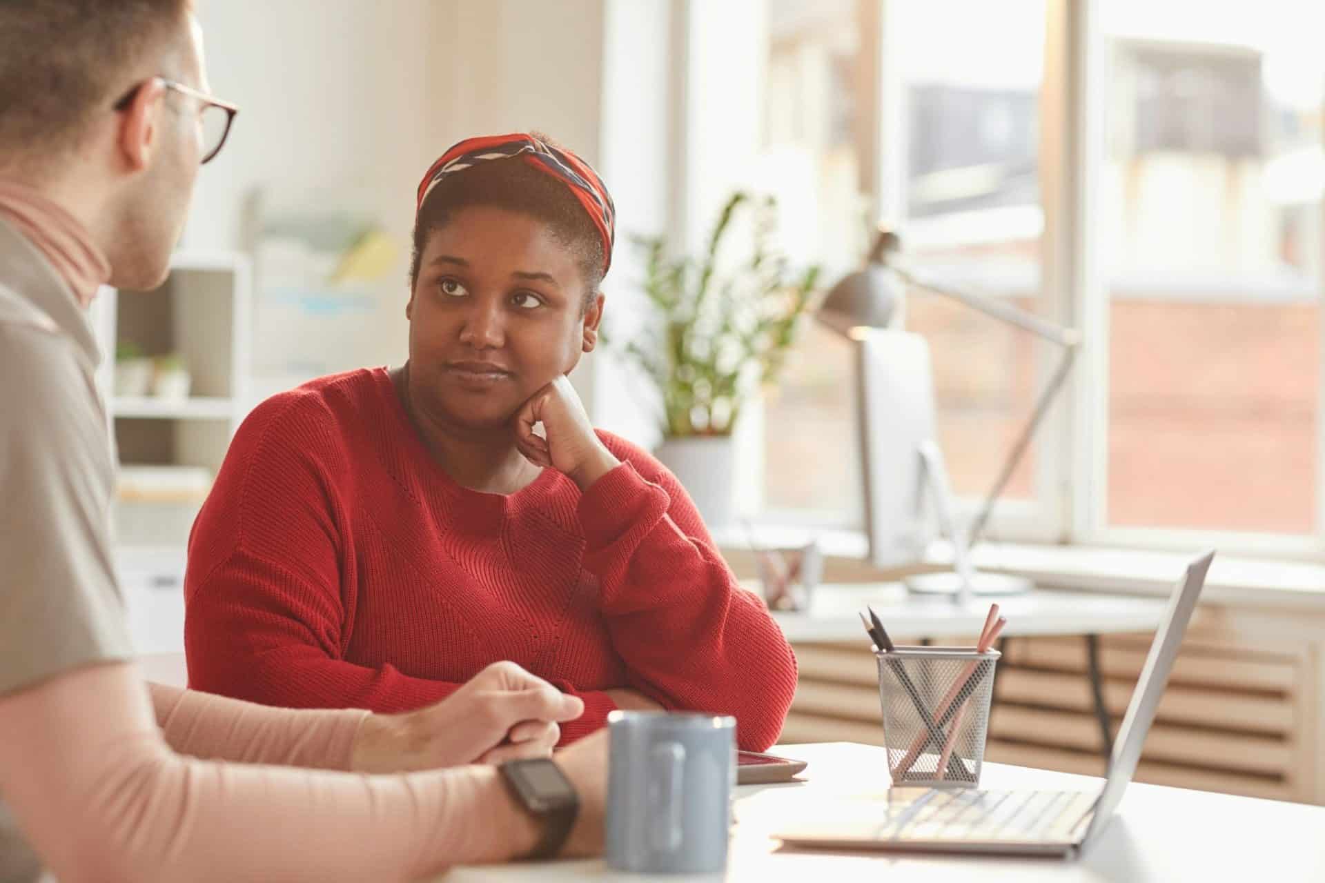 A woman staring at the man's face
